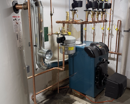 Six zone boiler installed with indirect storage tank for hot water